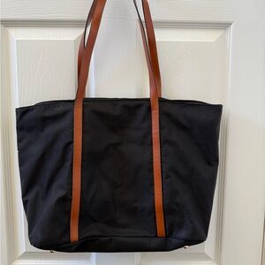 Stylish Black Tote Bag with Brown Straps